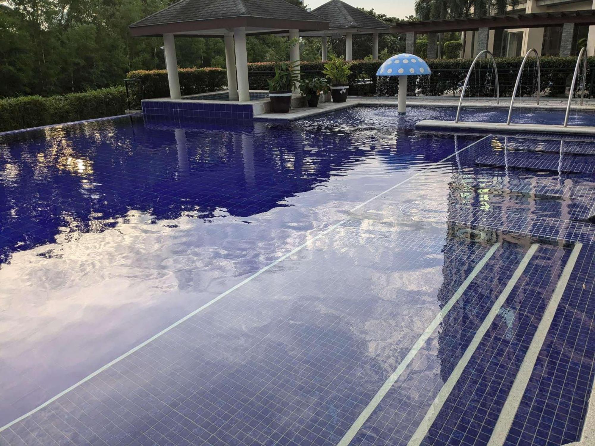 Bellagio One Bedrroom Bgc Burgos Circle By Christine Suites Ph Taguig Exterior photo